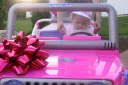 Jolie's hat matches the Barbie Jeep.