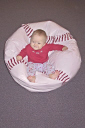 For some reason she loves being tickled in the beanbag chair.