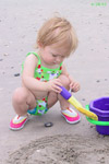 Jolie was a very busy bee, digging in the sand.