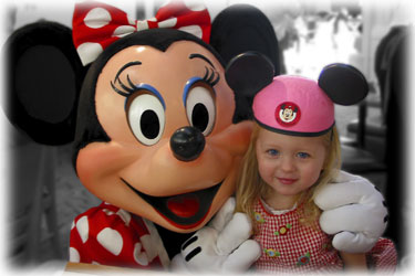 Minnie Mouse and Jolie, from our November 2004 trip to Disney