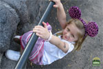 Jolie hanging from a railing