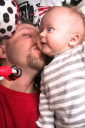 Jolie likes Daddy kisses.  I told her that thing hanging above us was missle-toe.