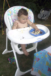 Kyle Julian begins the process of dissecting his cake.