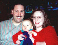 Beth (Rosser) Smith and her family: her husband Brian and her son Christopher, November 2000