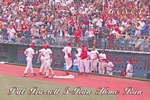 Pat Burrell returns to the dug-out after his 11th homer of the year